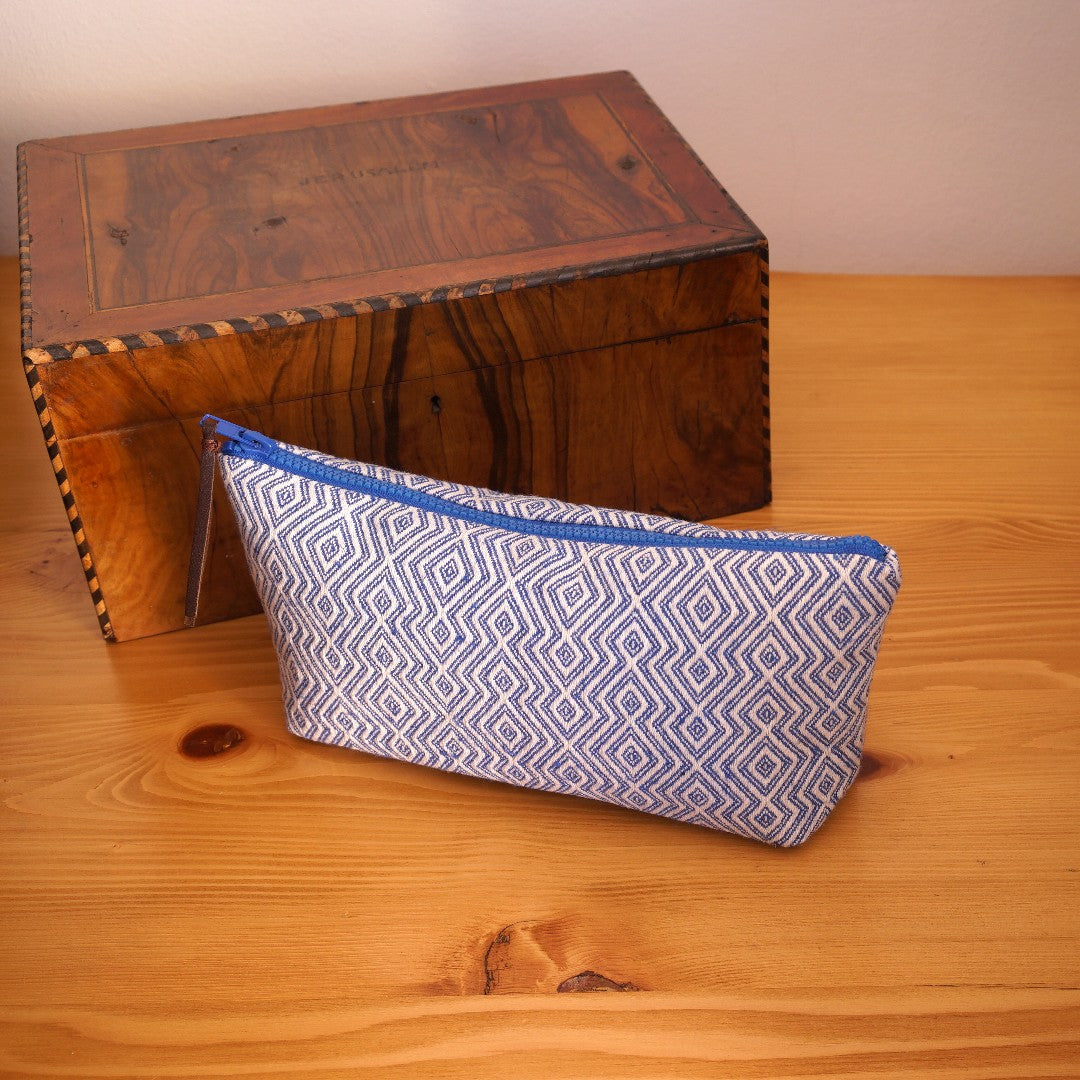 Apasa Handwoven Makeup/Pouch Bag, clutch cosmetic bag angled with decor box